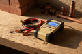 Insulation resistance tester 500V on workbench with test leads